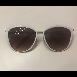 White rim sunglasses from Francesca’s.